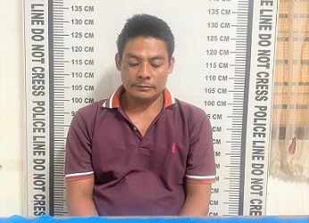 Pelaku Rahmat Kurniawan Harahap alias Wawan dan barang bukti 